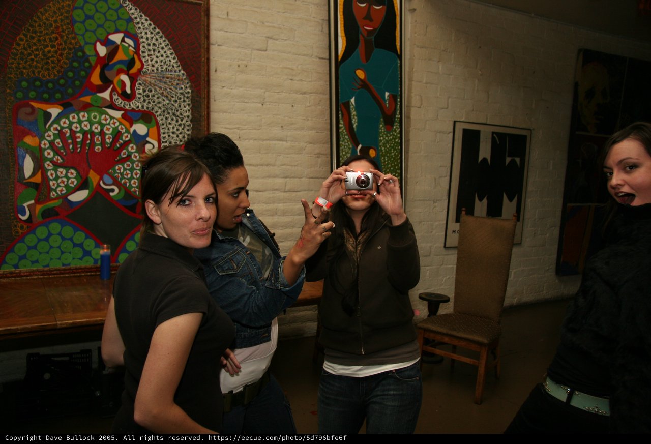Friends Capture Moments at an Art Gallery Opening