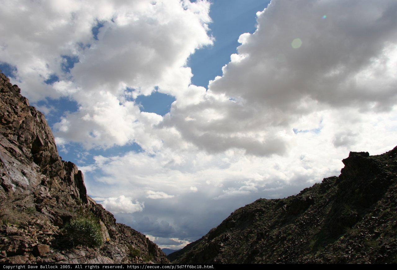 Canyon glimpse of the Cumulus clouds and Mountain Range