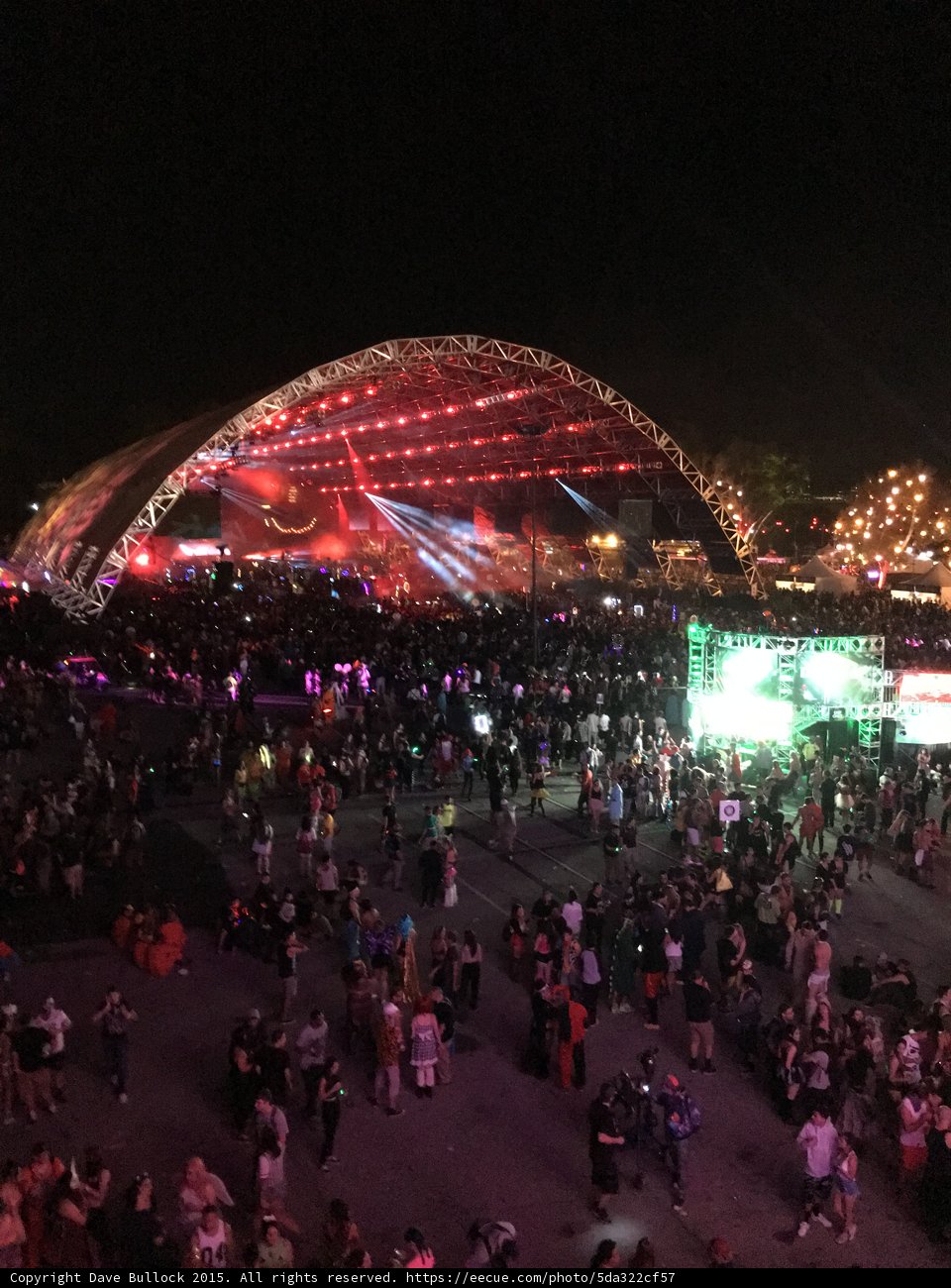 Night-time Concert Crowd in Front of Illuminated Dome