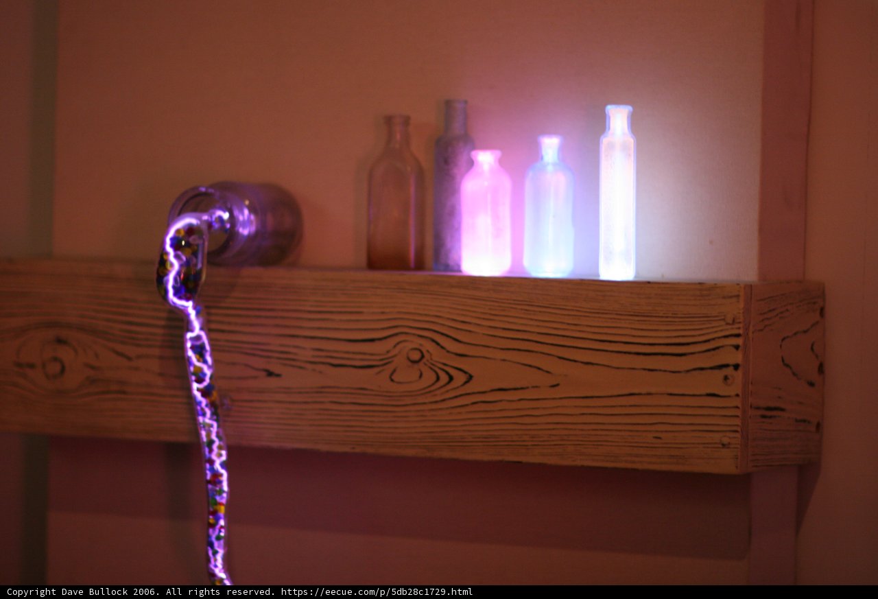 Illuminated Shelf with Wooden Containers