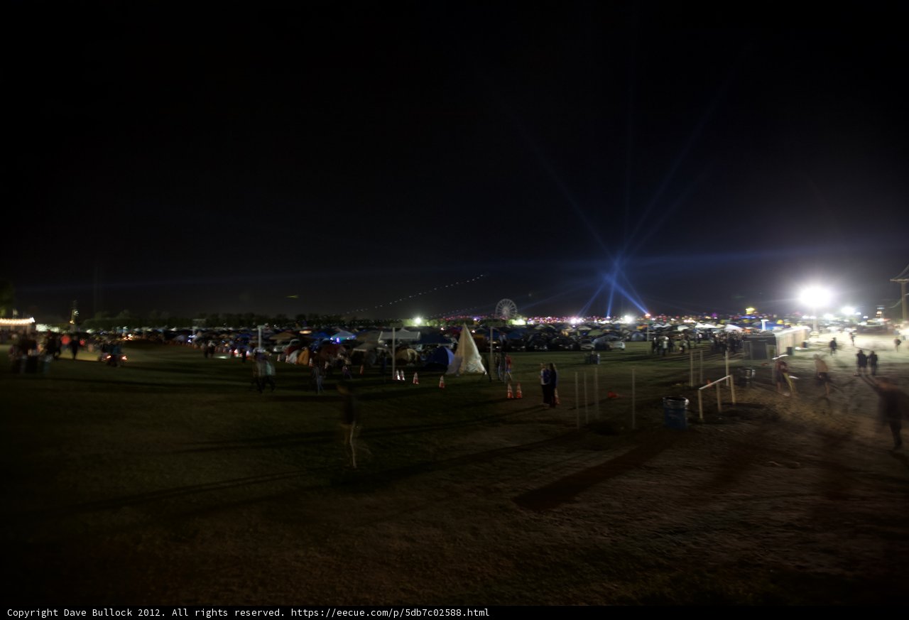 Night Sky Illuminated by Crowd and Lighting at Coachella Festival