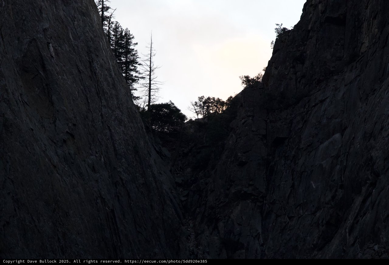 Twilight View Through Narrow Rock Chasm in Yosemite
