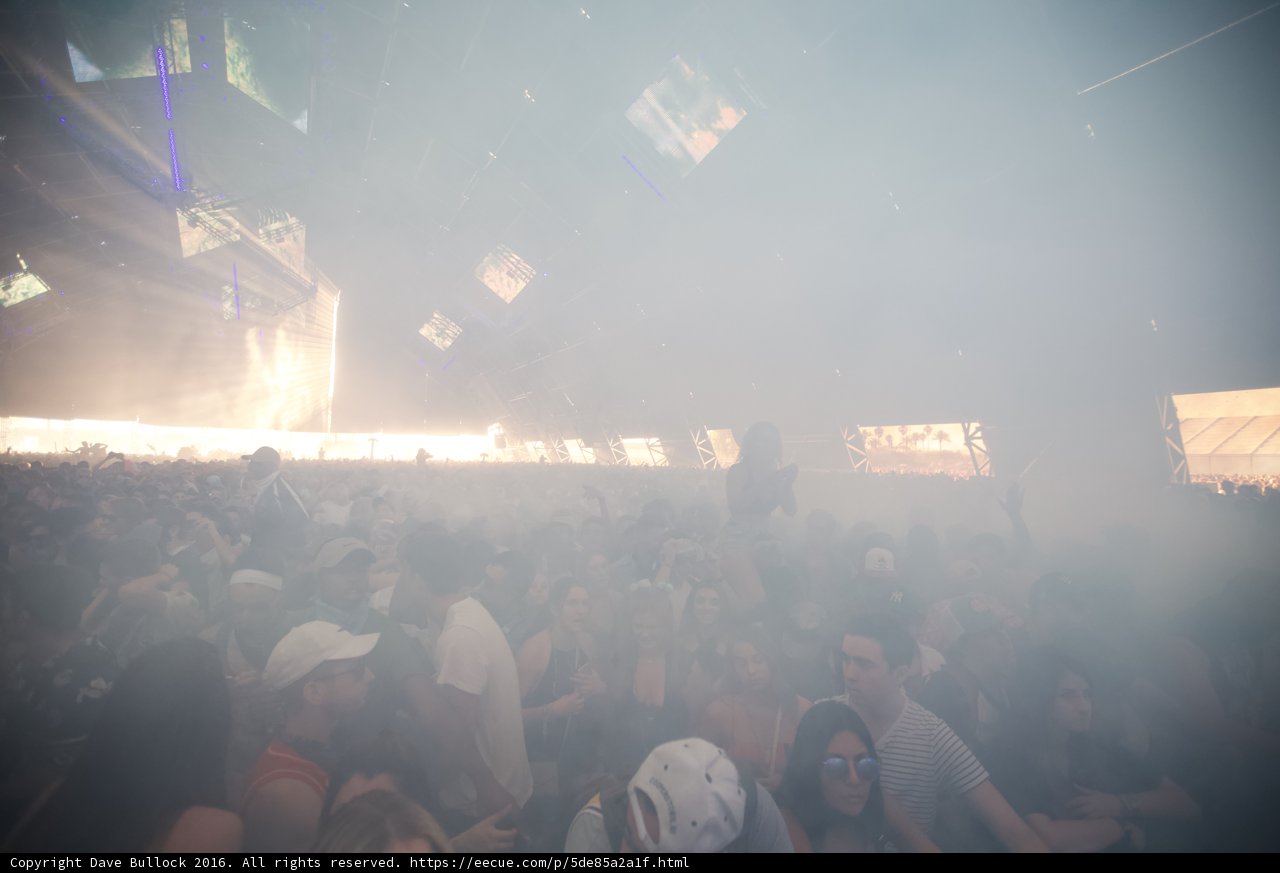 Smoke-Filled Concert Crowd