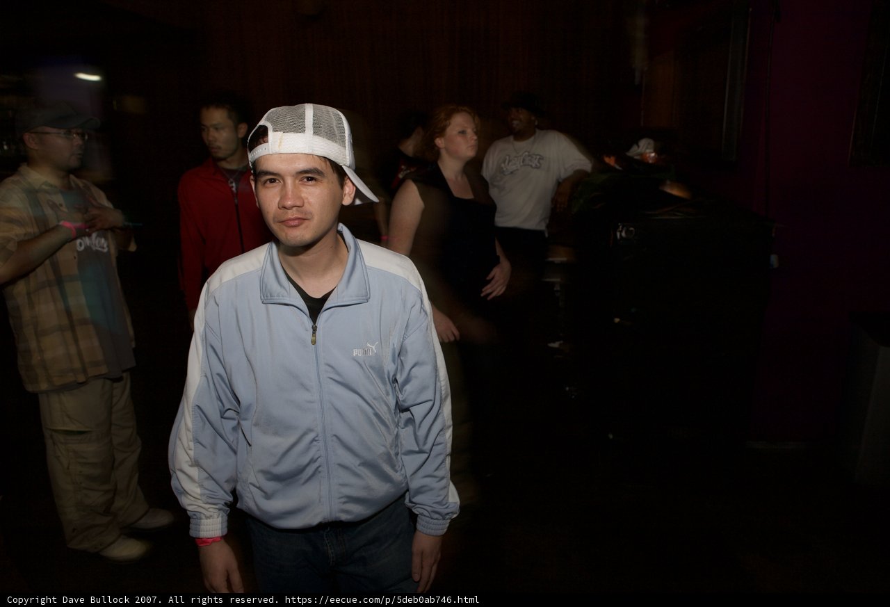 The White-Hatted Man in The Room