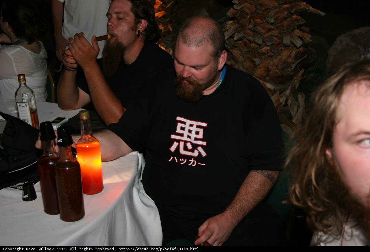 Bearded Man Enjoys Beer with Friends at Pub