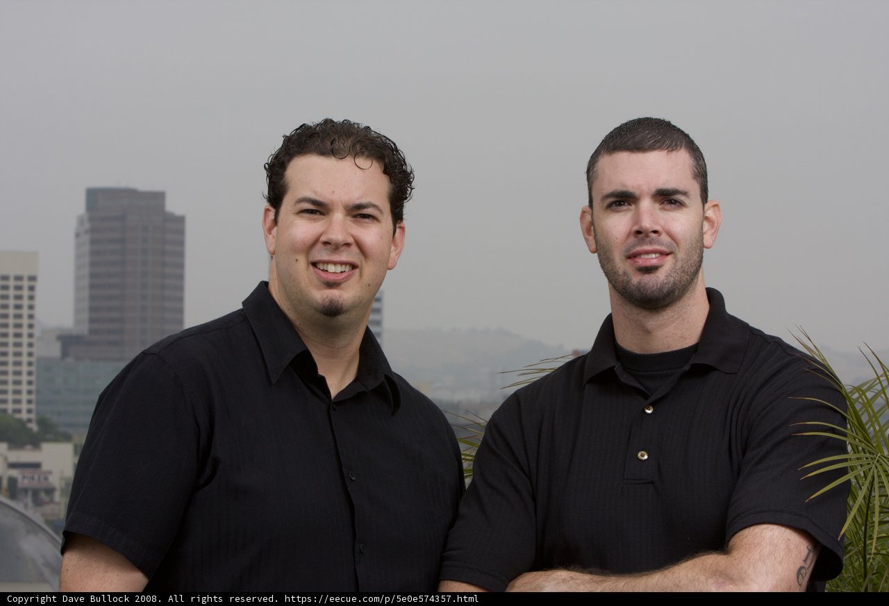 Two Men Smiling in the City