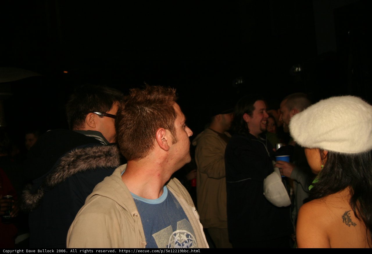 Man in White Beanie Cap at New Year's Eve Pub Celebration