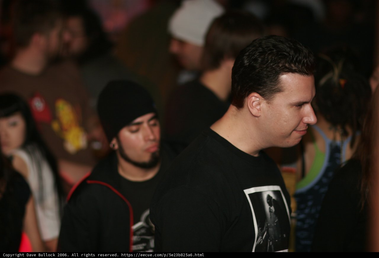 Cool and casual: A man in black shirt with headgear
