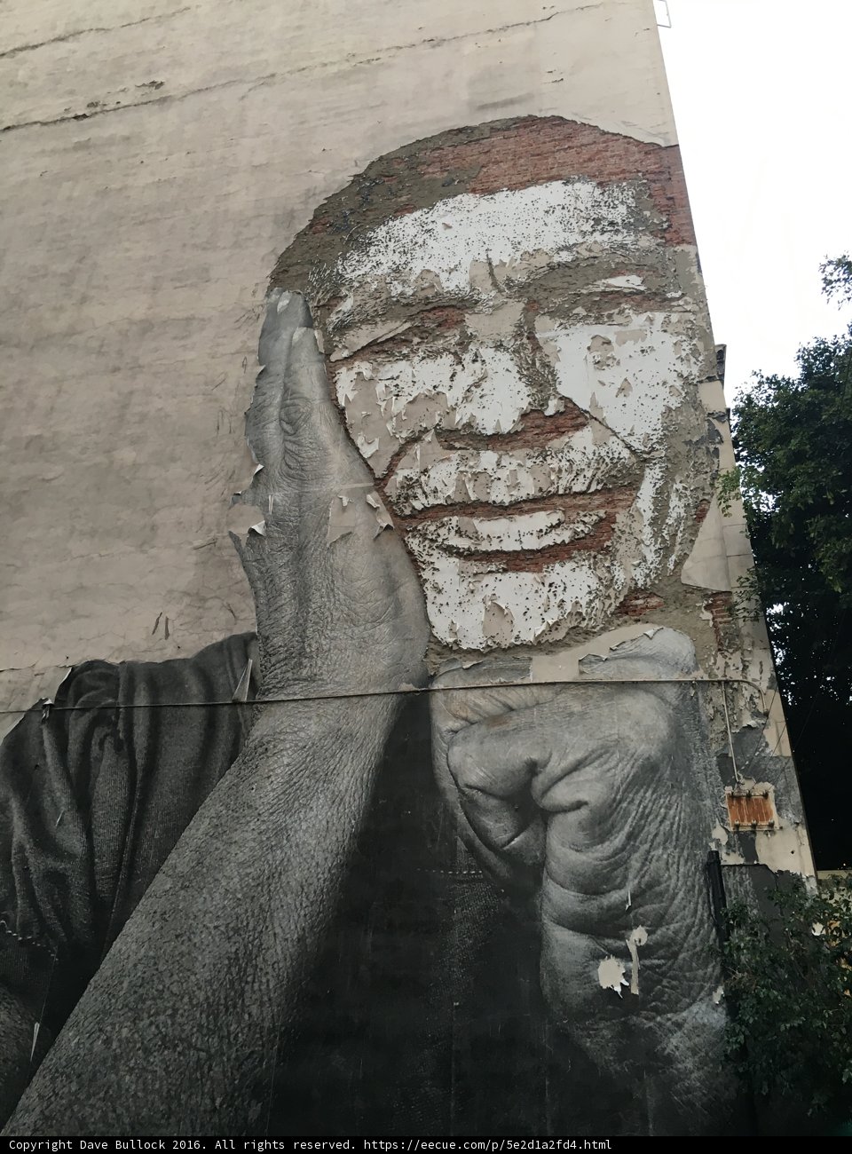 The Smiling Mural Man