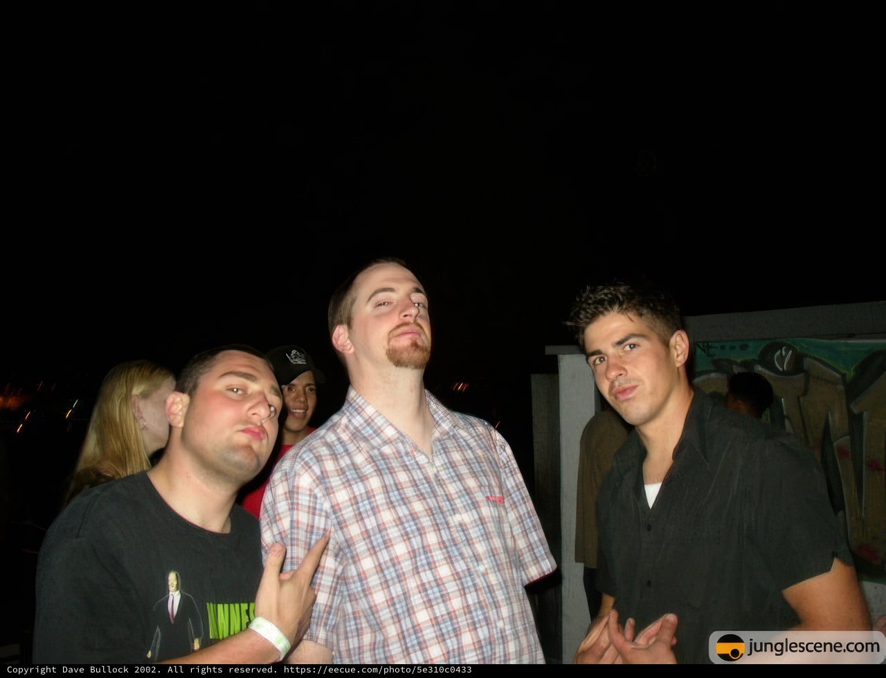 Three men enjoying a night under the stars