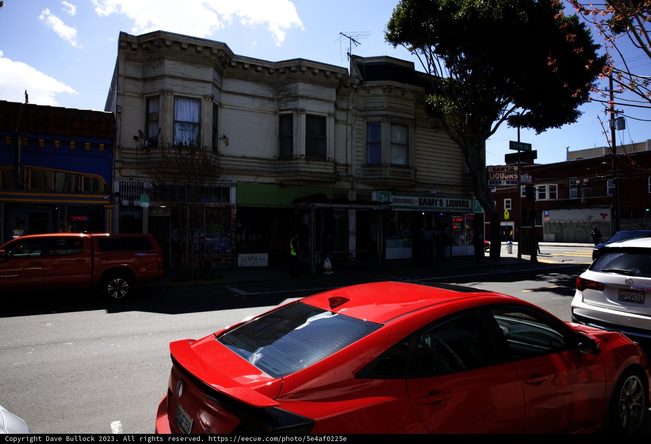 Vibrant Red Car in the Urban Landscape