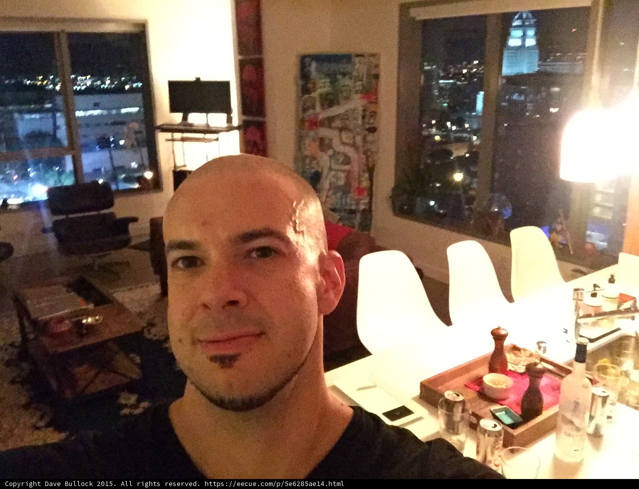Bald man in the living room