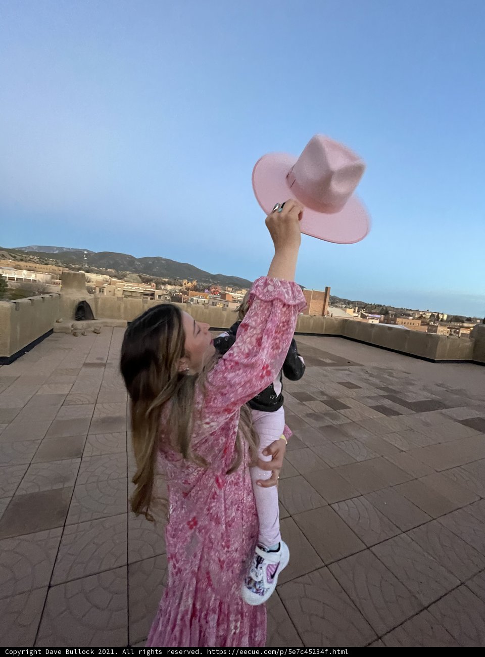 Joyful Moment on a Hilltop