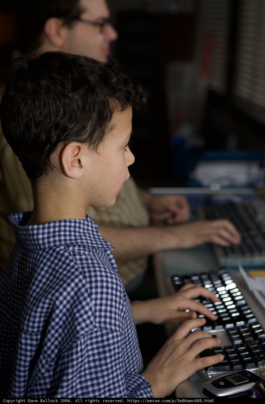 Teen Boy Typing Away
