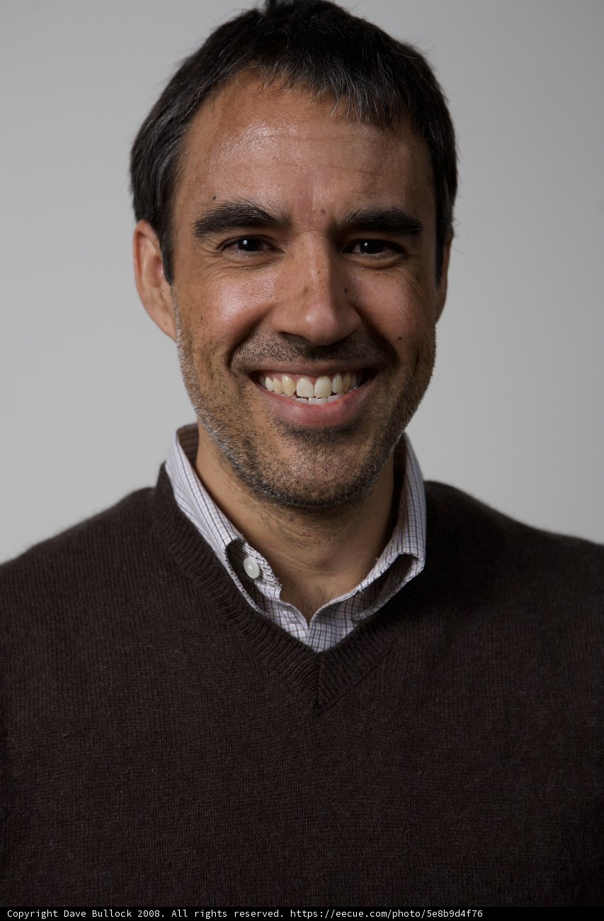 Happy Man in Brown Sweater