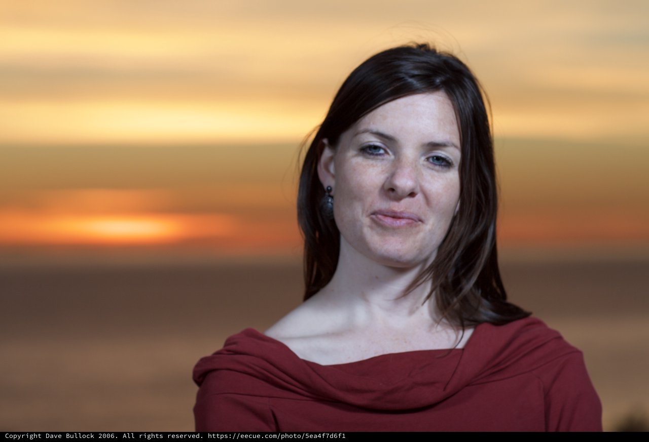 Woman Portrait at Golden Sunset Over Ocean