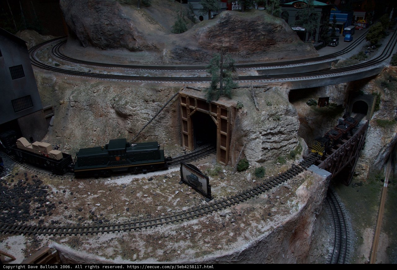 Miniature train arrives at the tunnel