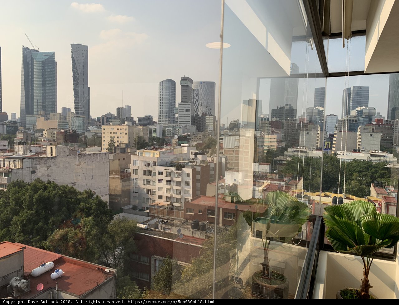 Urban Skyline from High-Rise Window