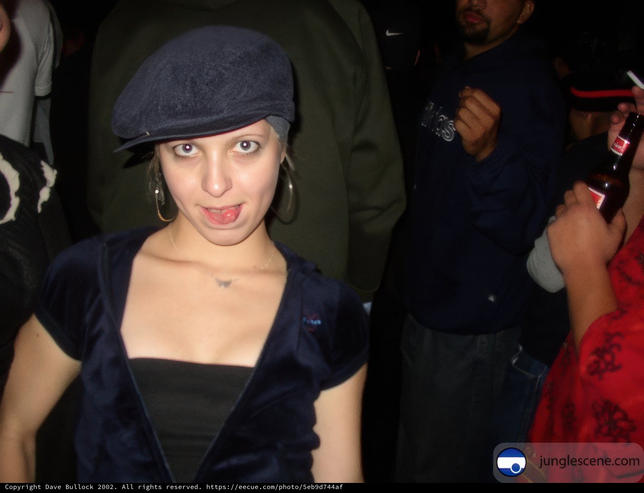 Woman in Blue Shirt and Hat