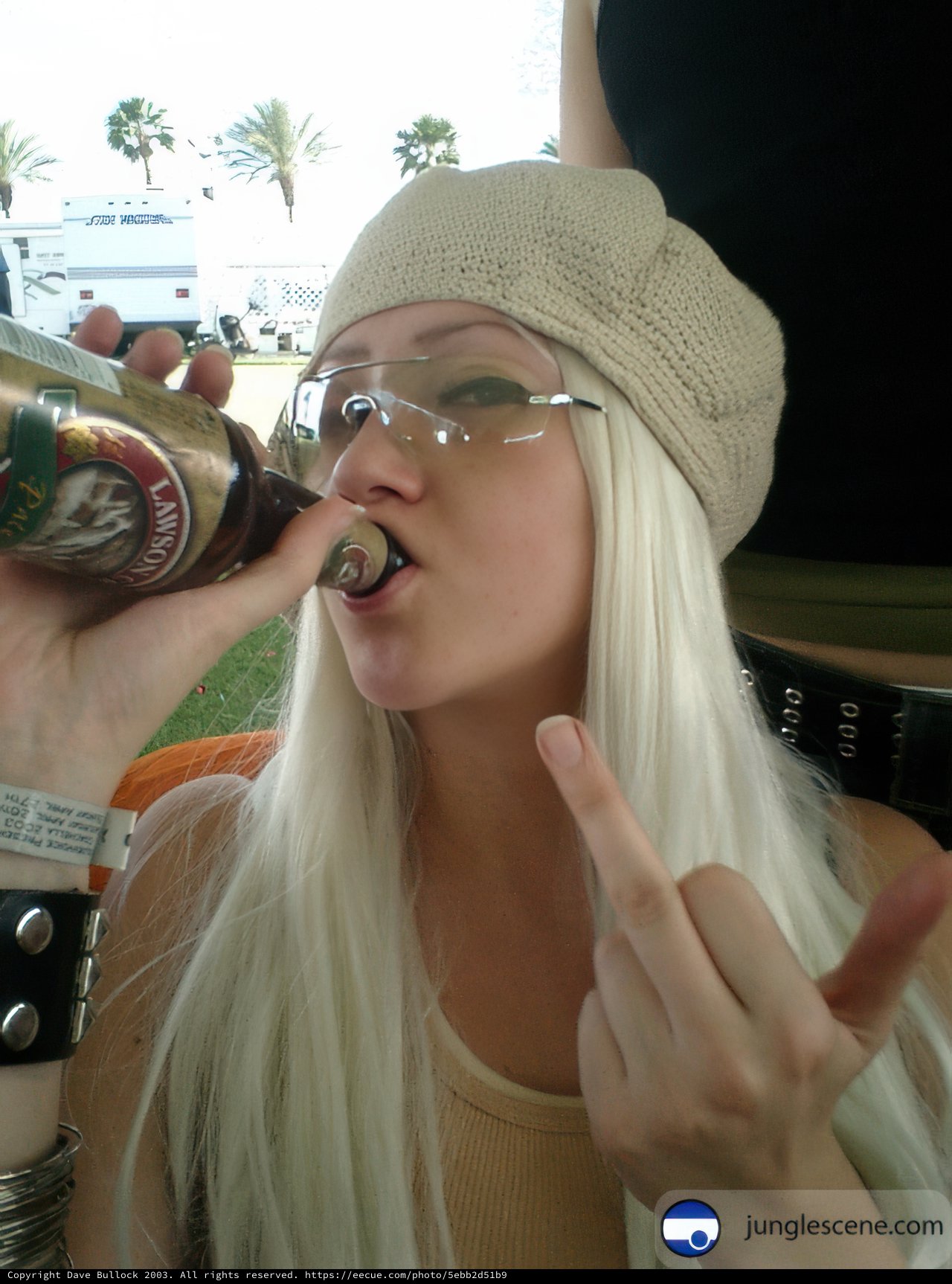 White-haired Woman Enjoying a Beer at Coachella