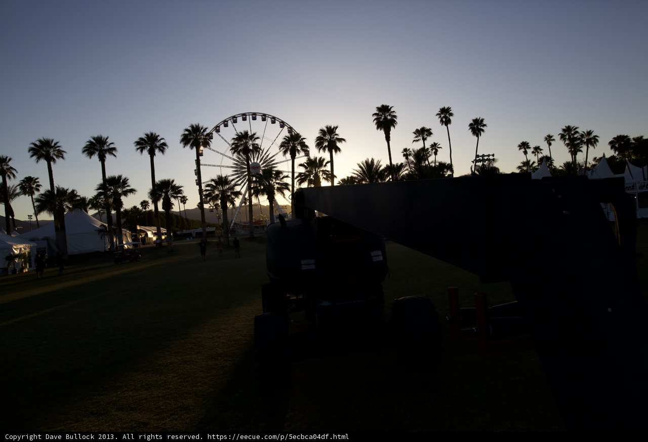 Parked Tractor at Palm Tree Silhouette