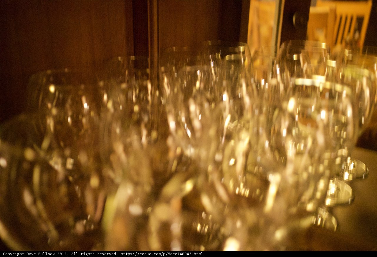 Last Call: Empty Wine Glasses at the Bar