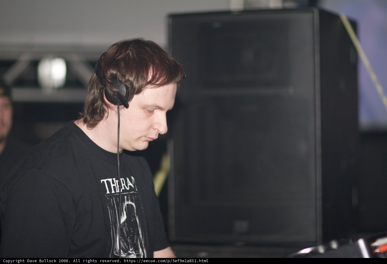 Man in T-Shirt Wearing Headphones