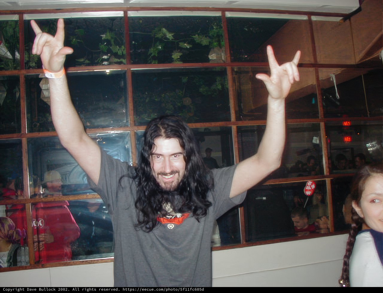 Long-haired Man at the Nightclub