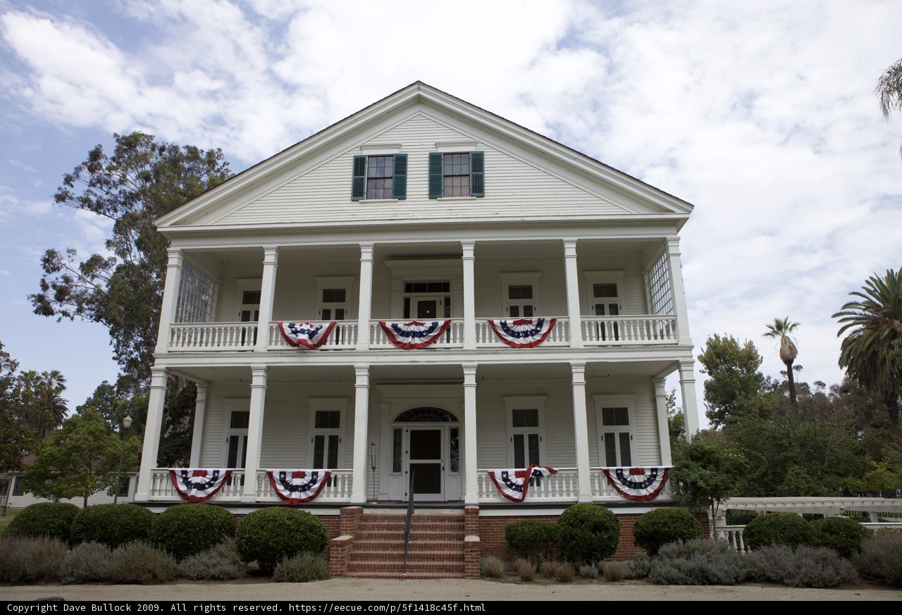 Serene White House with Sprawling Porch