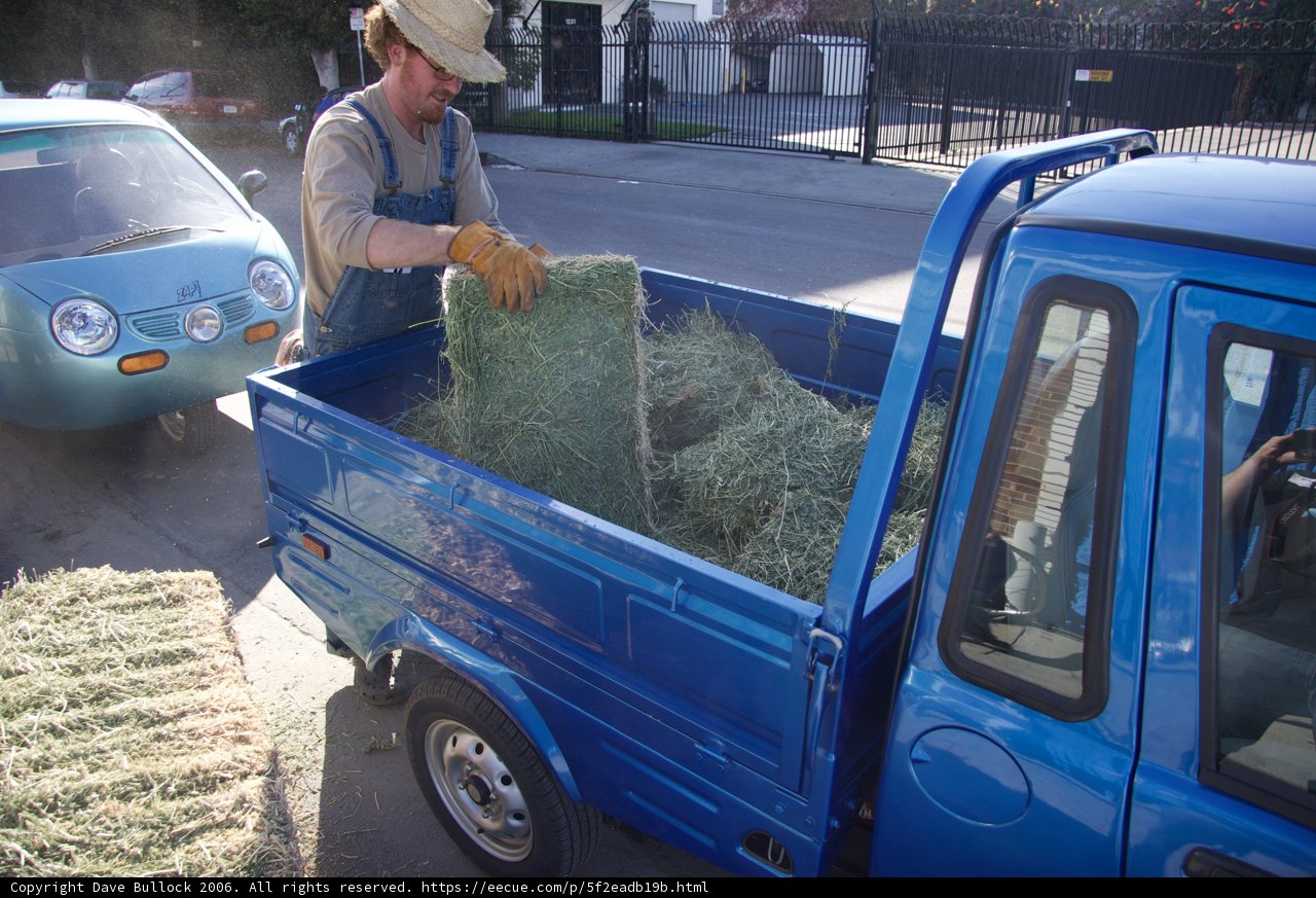 Loading a Pickup Truck with Hay