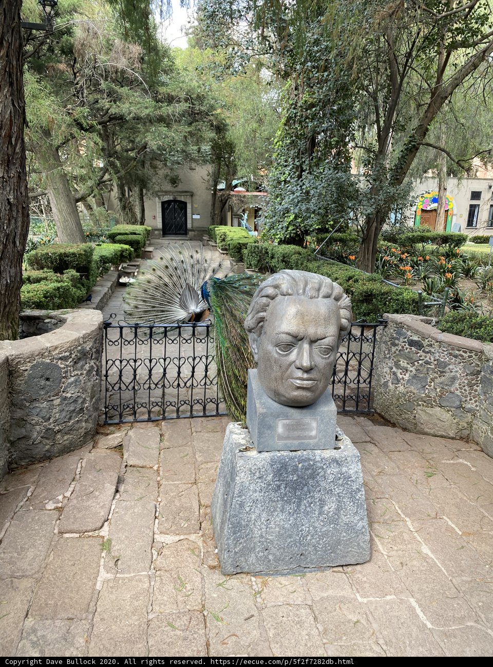 Statue of a Man in a Peaceful Garden