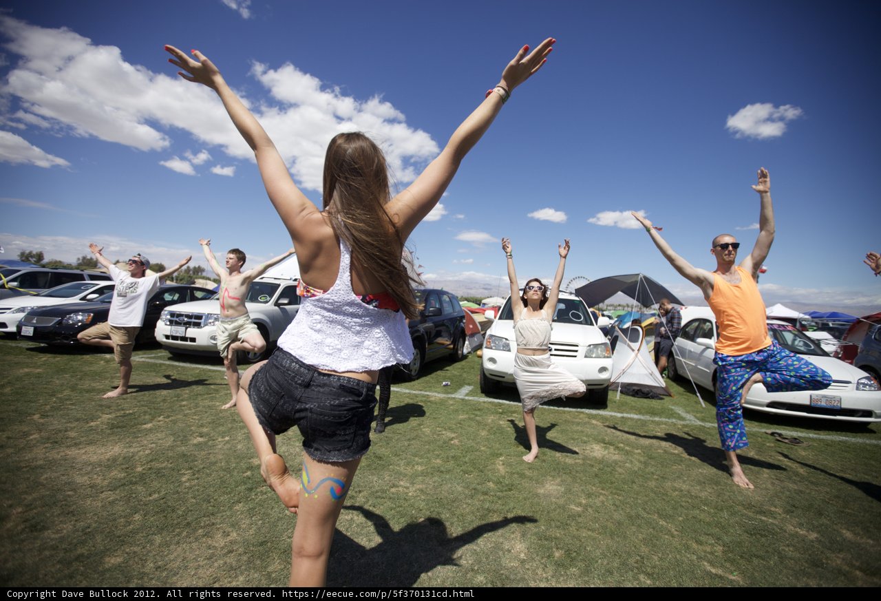 Yoga in the Grass with a View of Cars