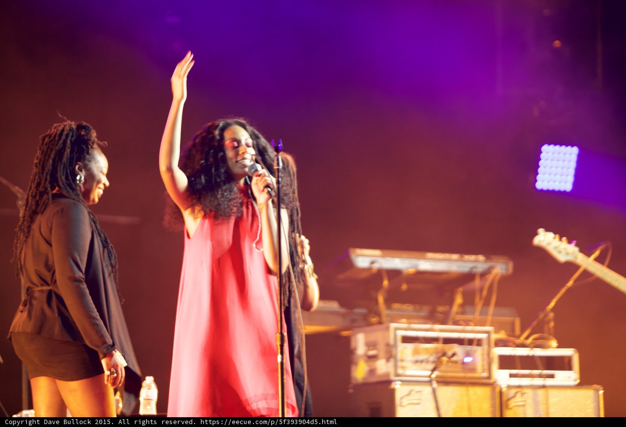 Solange Waving Goodbye Red Dress Arm Raised Backing Vocalist Dreadlocks LED Panel