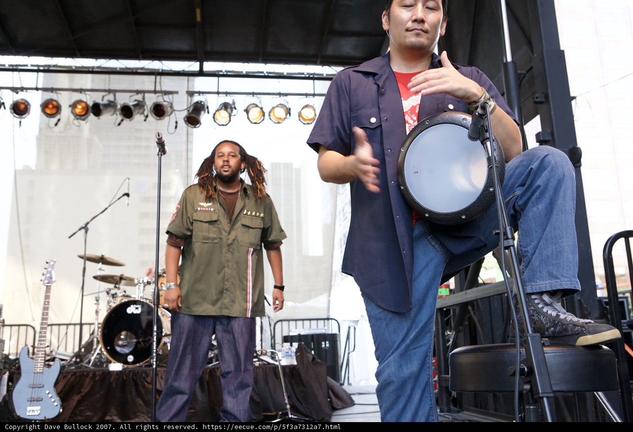 Blue Pants and Drum Set at Grand Performances Ozomatli
