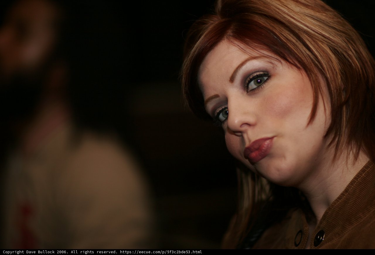 Red-haired Woman in Brown Jacket