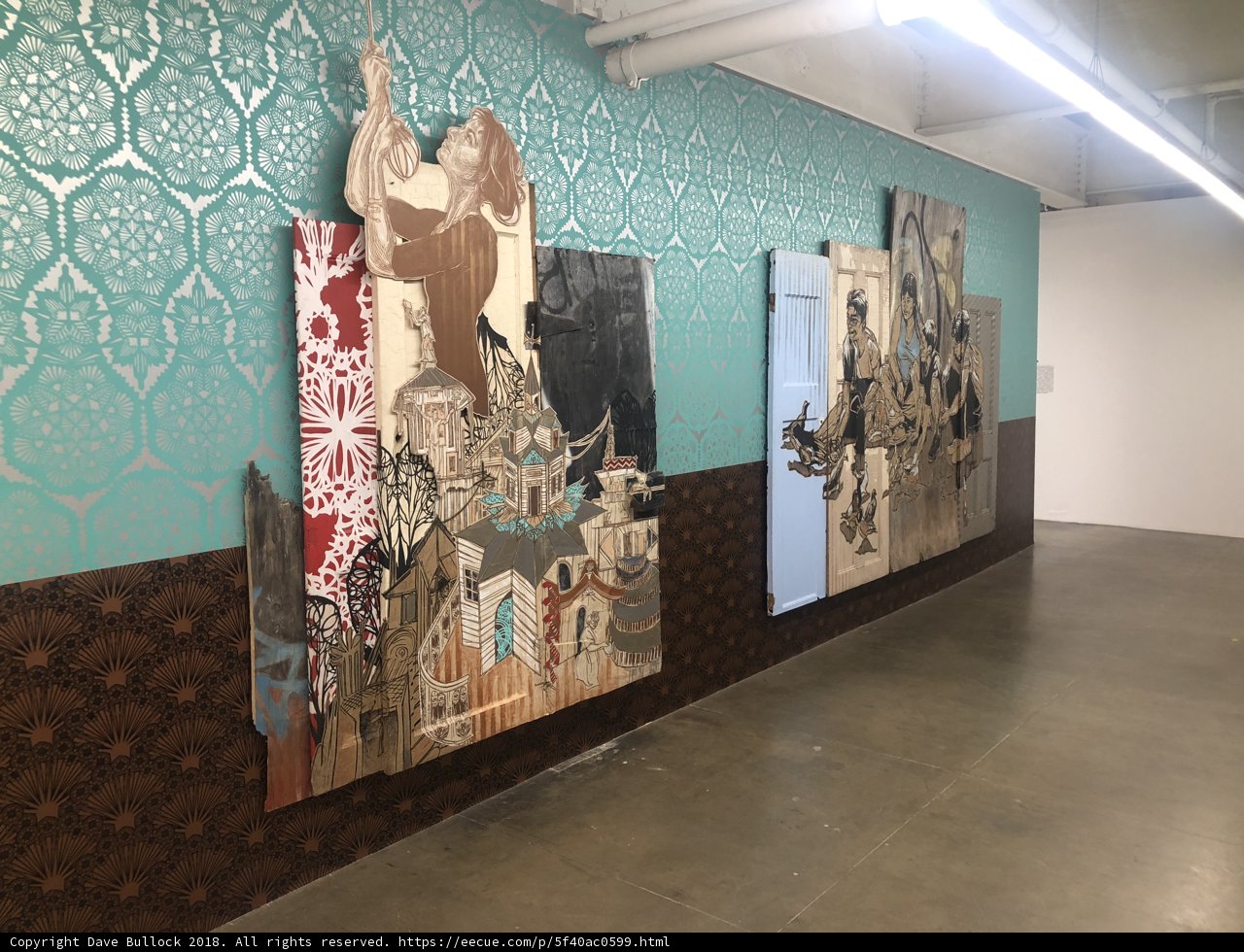 A Gallery of Paintings on a Large Wall