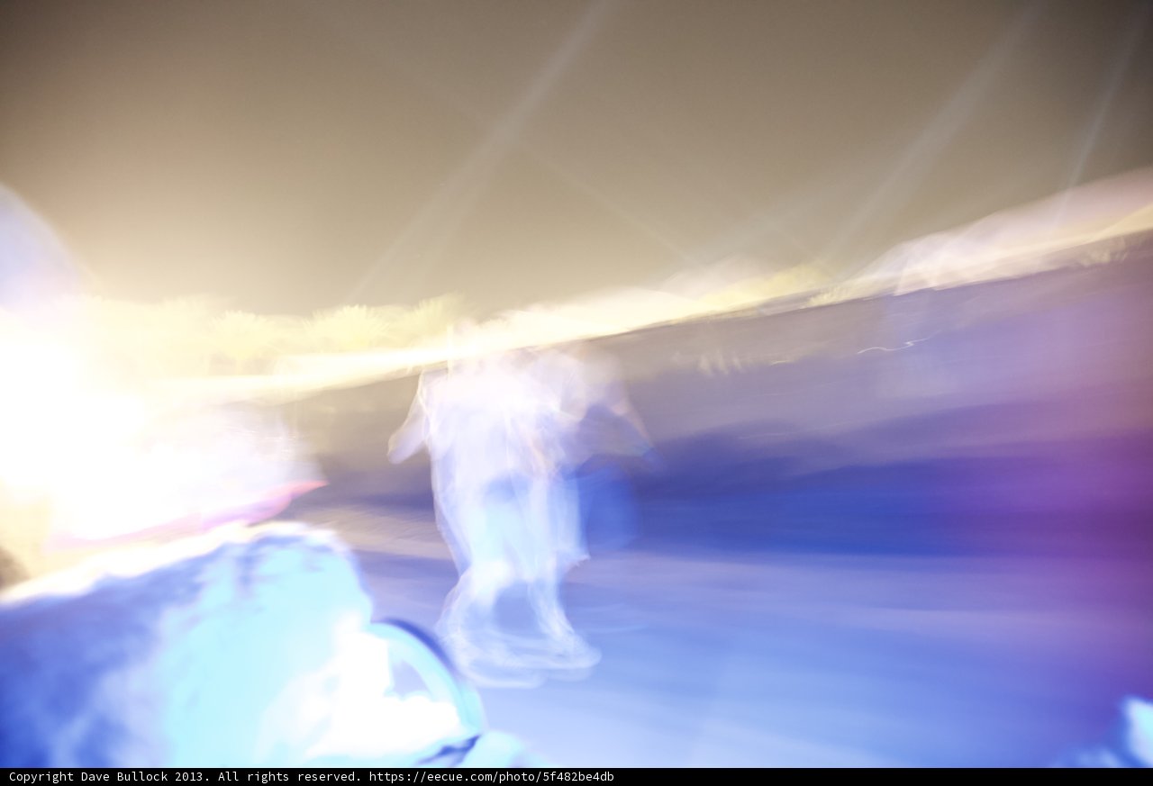 Blurry Skateboarder in Nature's Light