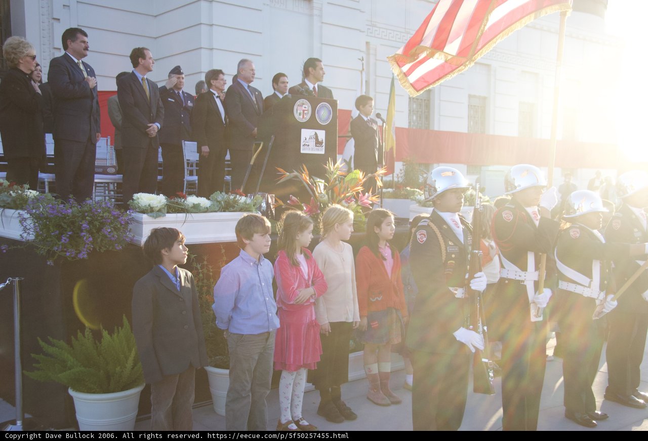 Group of People Standing in Front of the Flag