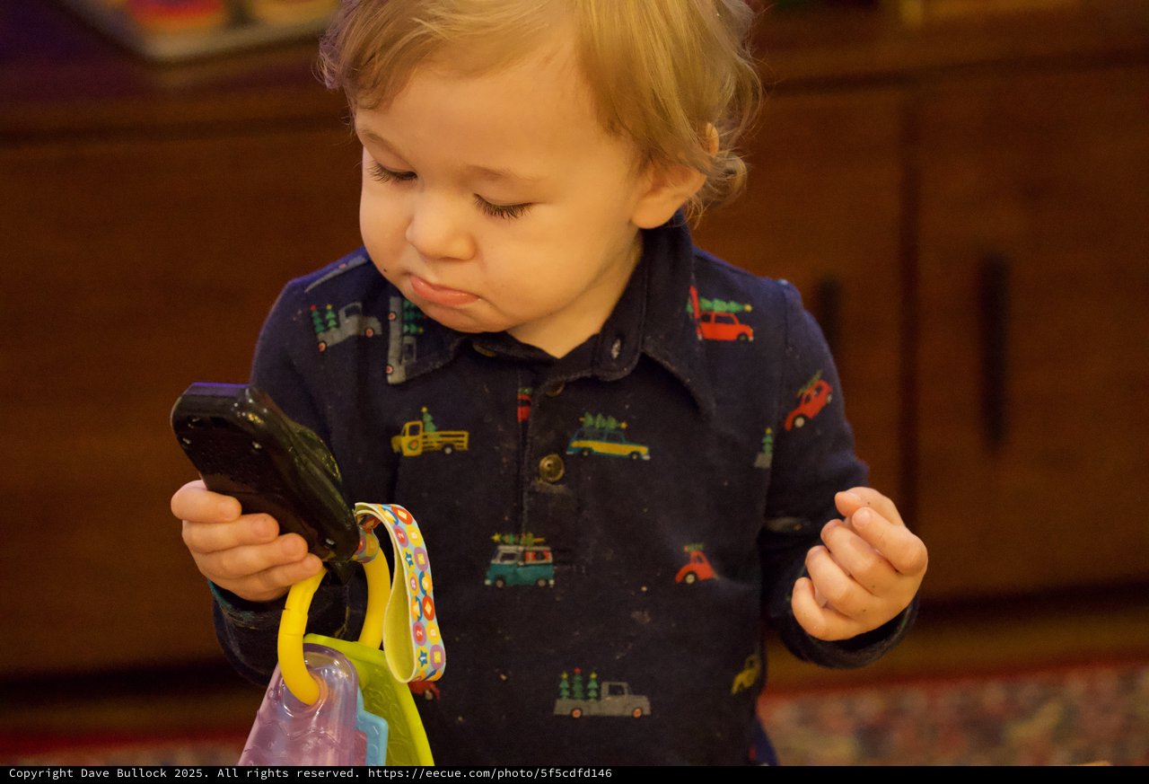 Toddler Exploring Vegetables with Curious Expression