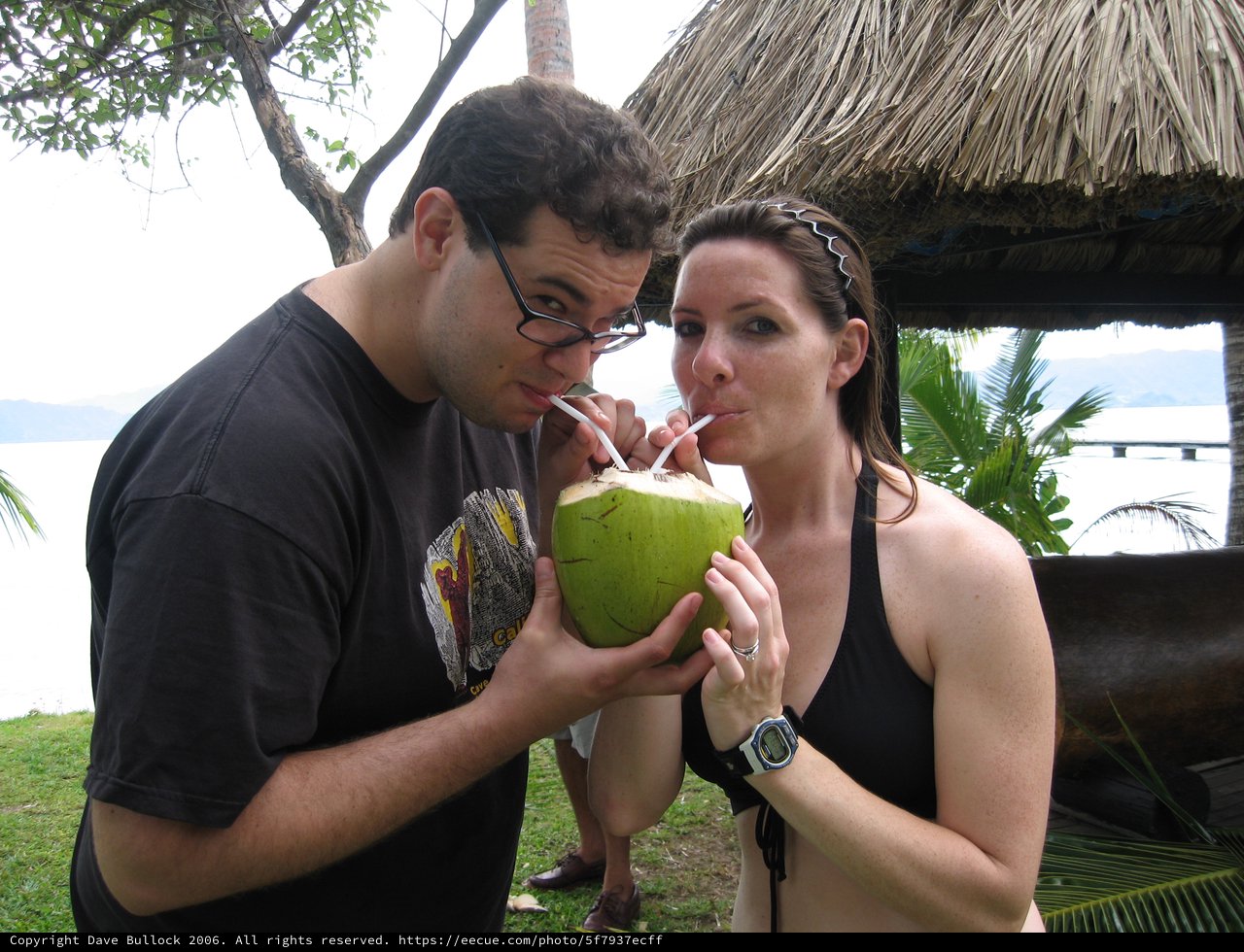 Couple Sharing Fresh Coconut Water in Fiji