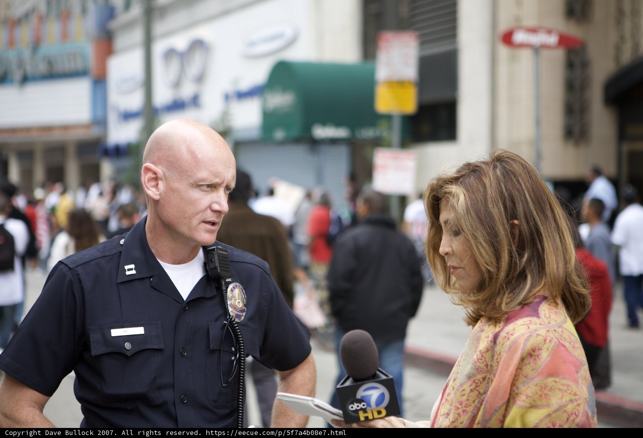 Police Officer Talks to Woman During 2007 Great American Boycott