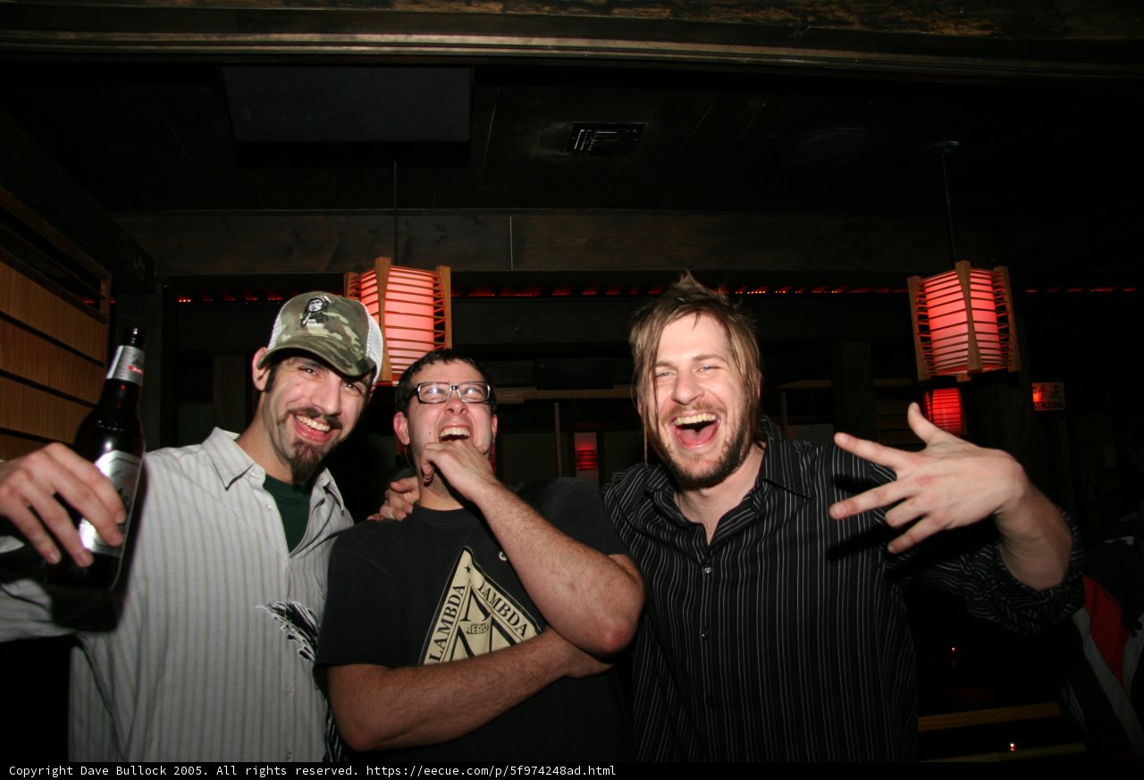 Black Shirted Man Enjoying Night Out