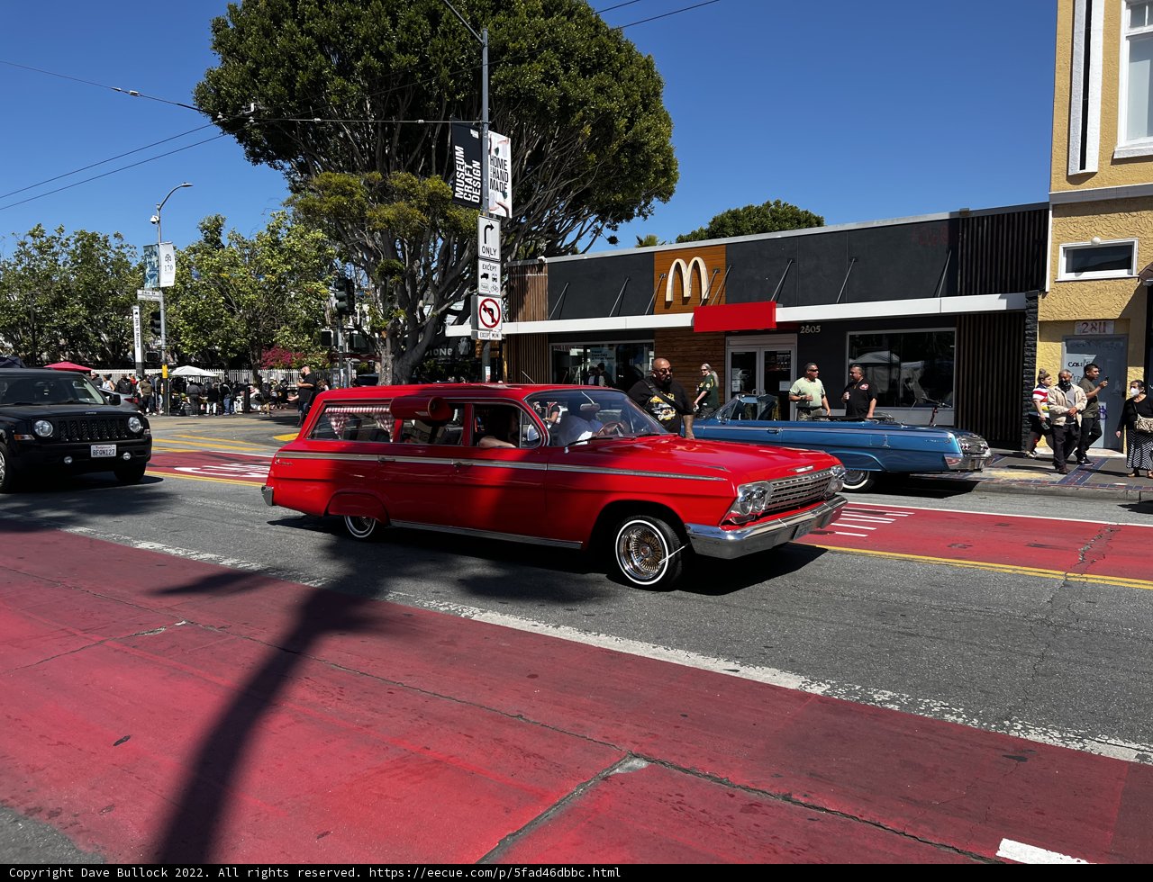 Red Convertible on City Streets