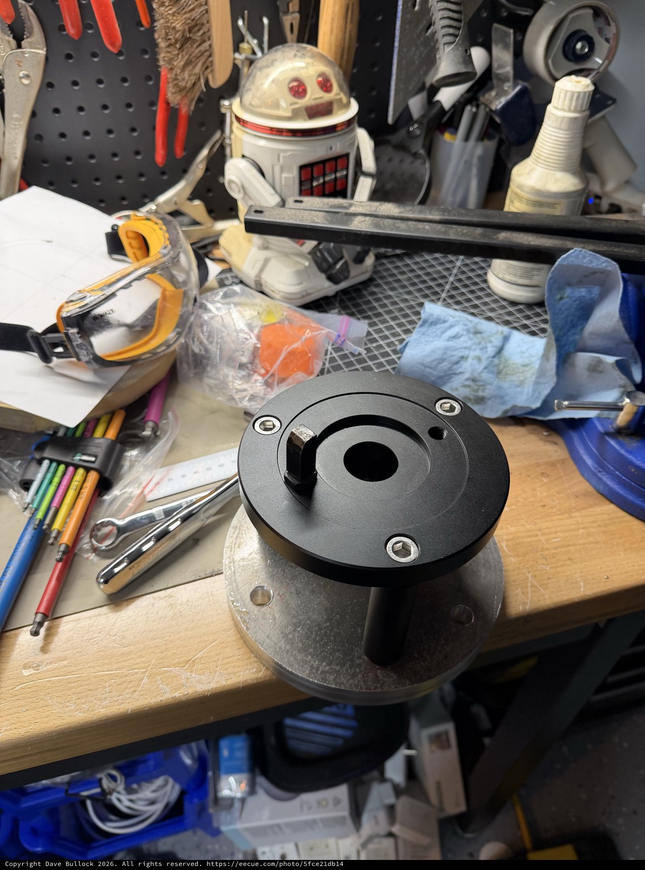 Custom Machined Adapter Mount on Workshop Bench