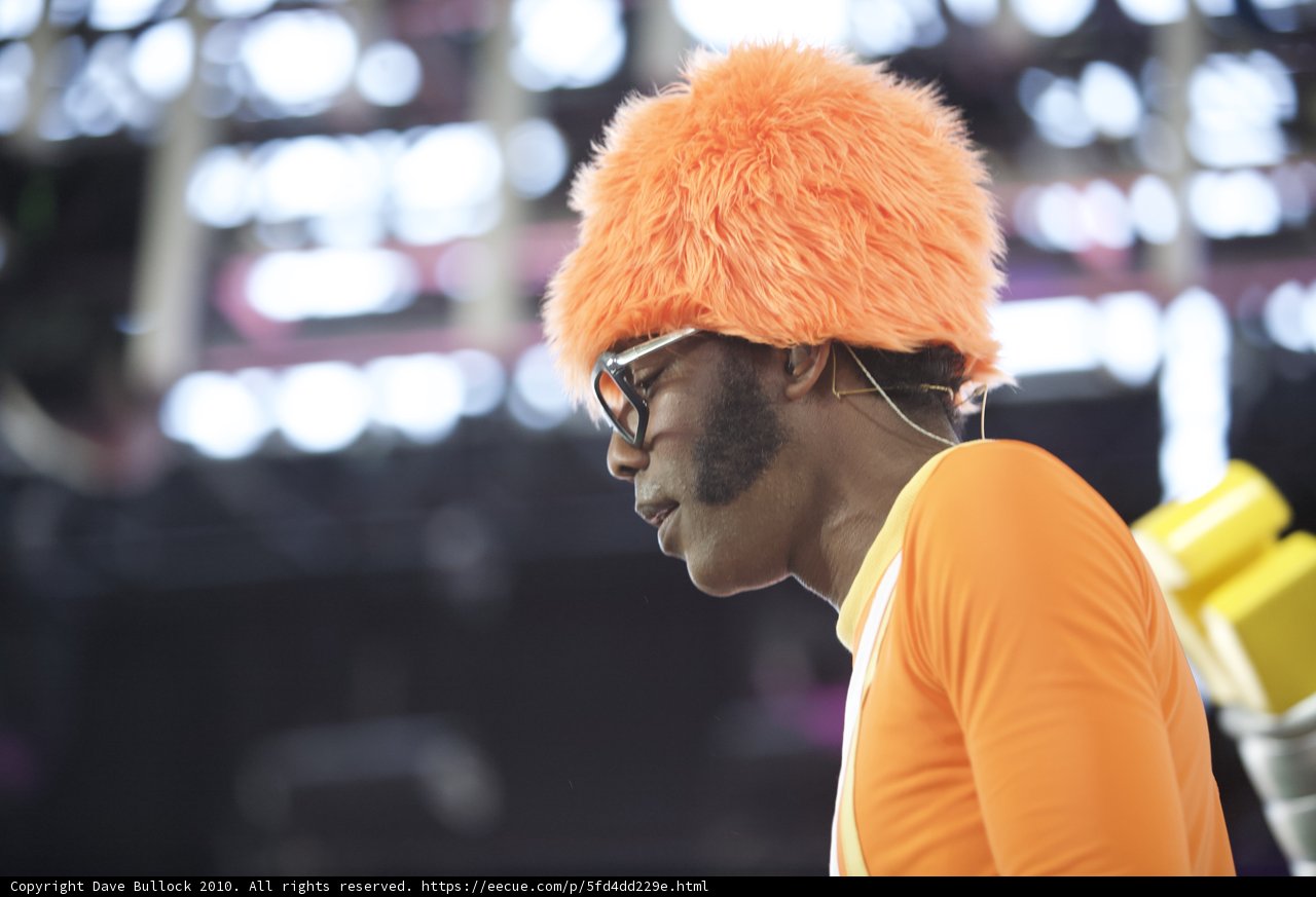 The Happy Man in the Orange Hat