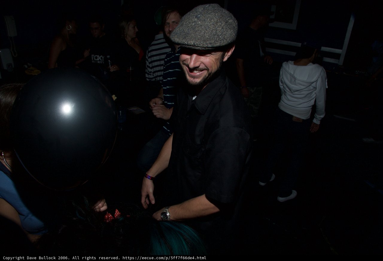 Party Hat and a Black Sphere Balloon