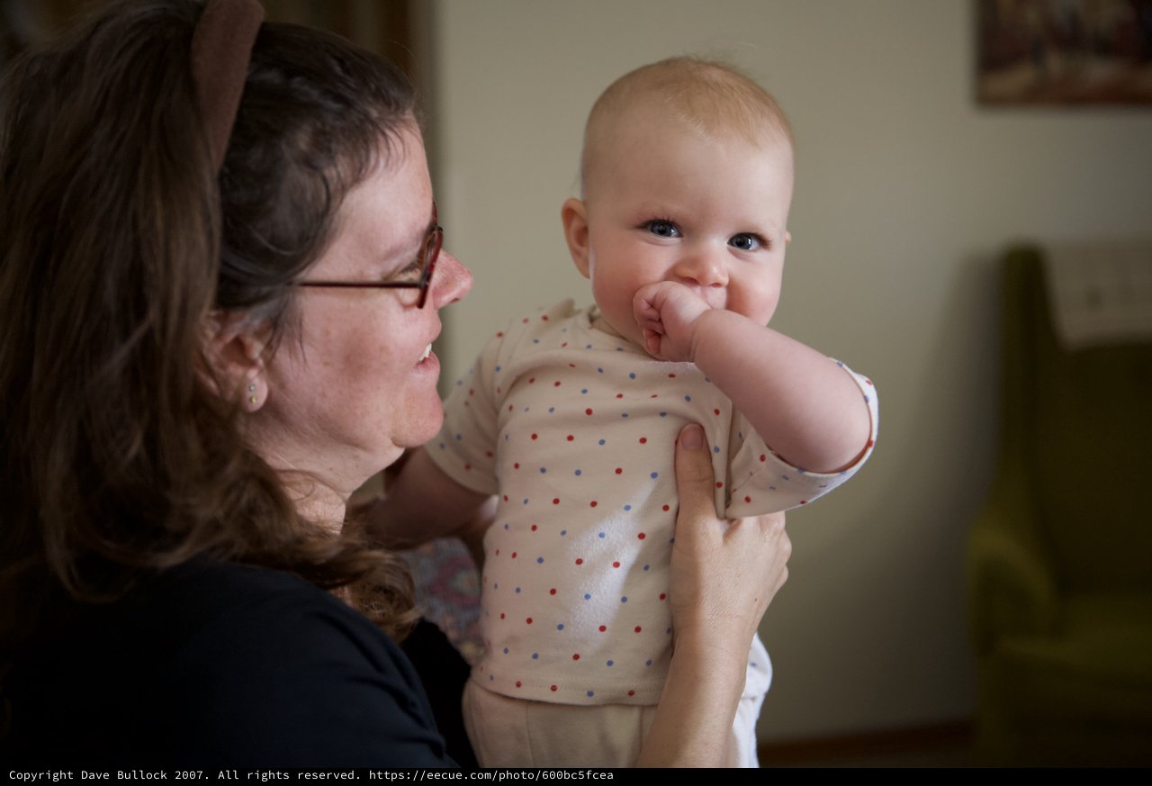 Joyful Moment Between Mother and Baby Indoors