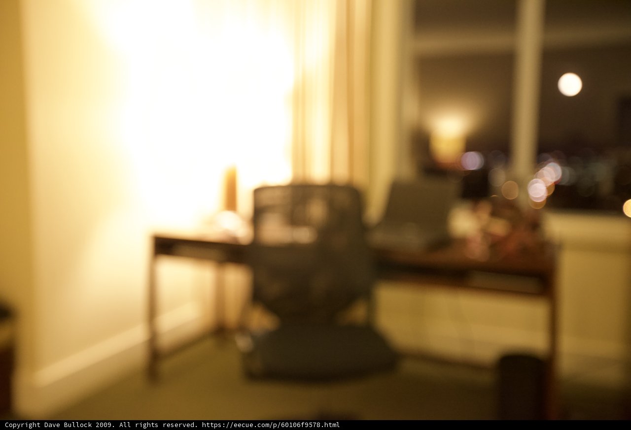 Blurry Desk and Chair in a Cozy Living Room