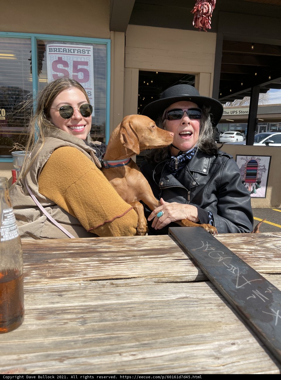 Rhoda and Lori's outdoor coffee with furry friend