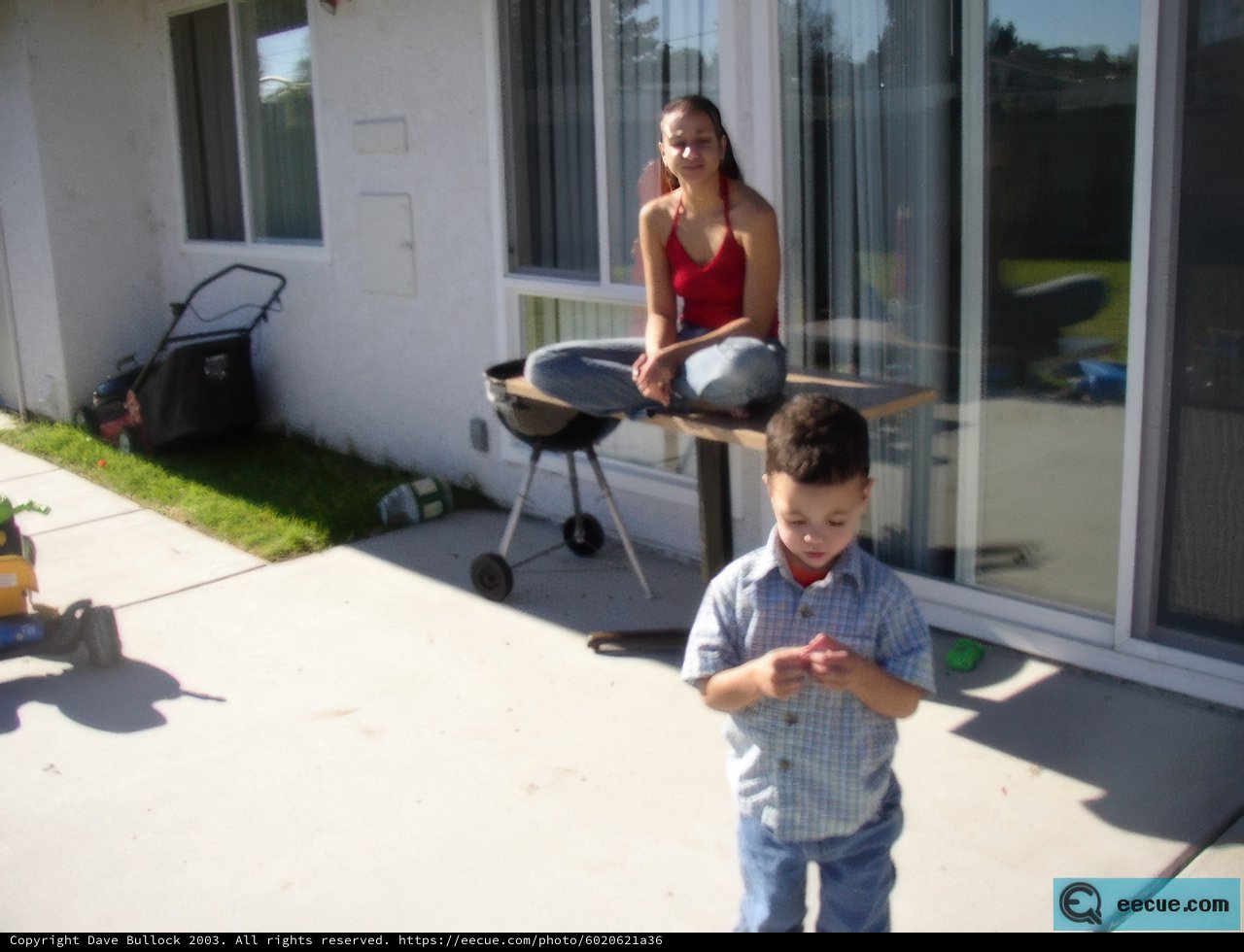 Mother and son enjoying the outdoors on their patio